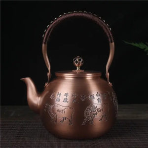 Théière Chinoise Ronde en Cuivre Taureaux 1.5L